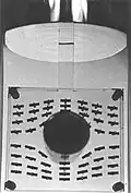 The cylinder has been cooled from 4.2&nbsp;K to 1.6&nbsp;K. The current in the electromagnet has been kept constant, but the tin became superconducting at about 3&nbsp;K. Magnetic flux has been expelled from the cylinder (the Meissner effect).
