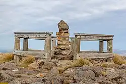 view of some structure on a mountain summit