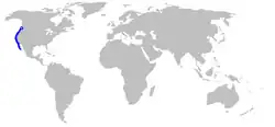 World map with blue shading along the western coast of North America