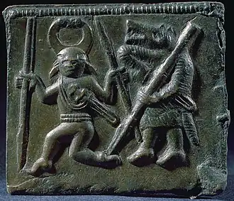 Bird-horned helmet figure on one of the Torslunda plates (c. 7th century).
