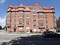 Typical apartment block in red brick (1914).