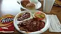 BBQ beef platter with baked beans and coleslaw