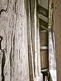 Trelystan Church. Gap between panelling and outer timber frame.