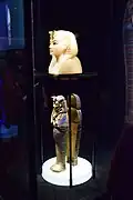 The fourth stopper with one of the canopic coffins placed underneath
