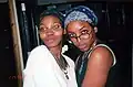 Image 96Two women wearing bandanas, 1999. (from 1990s in fashion)