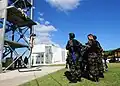The Fleet Anti-terrorism Security Team demonstrates fast rope techniques for Moroccan sailors at the NMIOTC in Souda Bay, Greece, during exercise Phoenix Express.