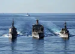 Kongō and Ikazuchi being refueled