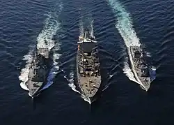 JS Ikazuchi and JS&nbsp;Kongō replenish with USNS&nbsp;Tippecanoe on 5 December 2010.
