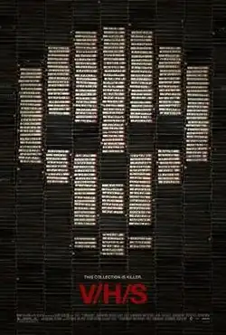 Stacks of black VHS tapes, some with white labels that come together to form a skull shape.