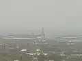 Distant view of the Port of The Americas from Vigia hill