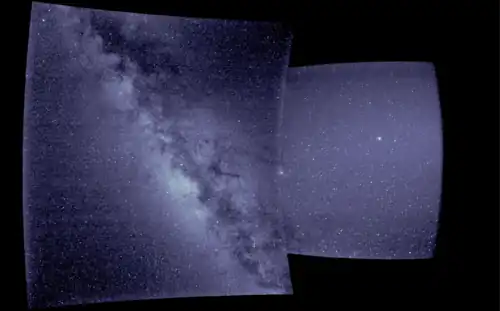 WISPR first light image. The right portion of the image is from WISPR's inner telescope, which is a 40-degree field of view and begins 58.5 degrees from the Sun's center. The left portion is from the outer telescope, which is a 58-degree field of view and ends about 160 degrees from the Sun.[11]