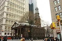 195 Broadway as viewed from the north. A small chapel, St. Paul's Chapel, is visible in the foreground.