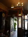 Interior showing leaded windows with coloured inserts