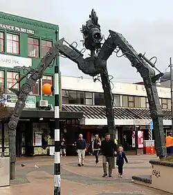Photo of large bronze tripod sculpture