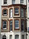 White and Terracotta coloured mathematical tiles on Grand Parade Location on Google Maps