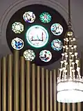 Interior, organ pipes, chandelier.