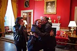 Members of the public in the Red Room during White House tour, 2012.