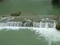 Nearby Xiniutan Waterfall (犀牛潭瀑布).