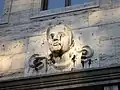 Breker sculpture above balcony windows